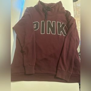Pink cowl neck sweatshirt.